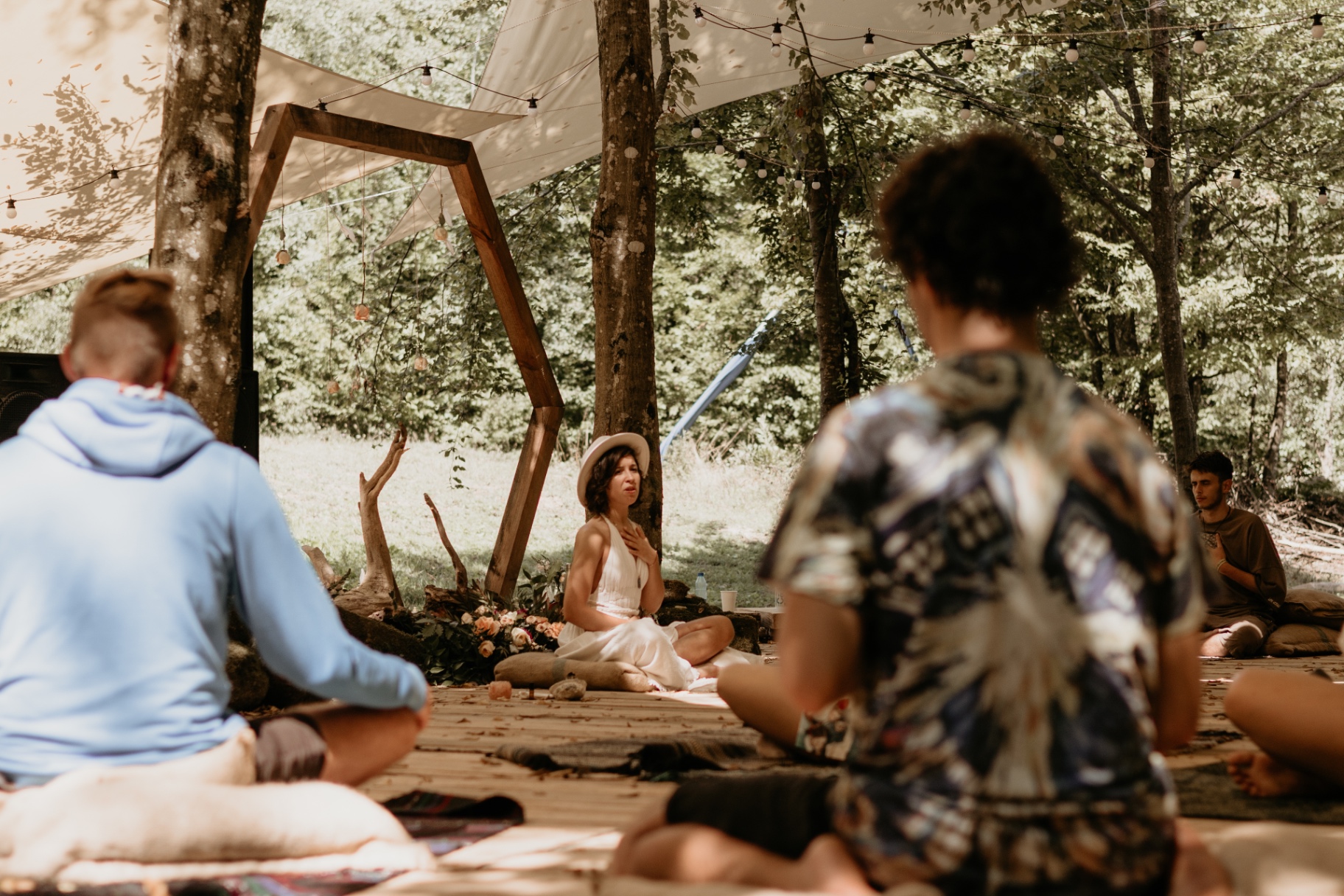 On-demand breathwork library still with altar and candle