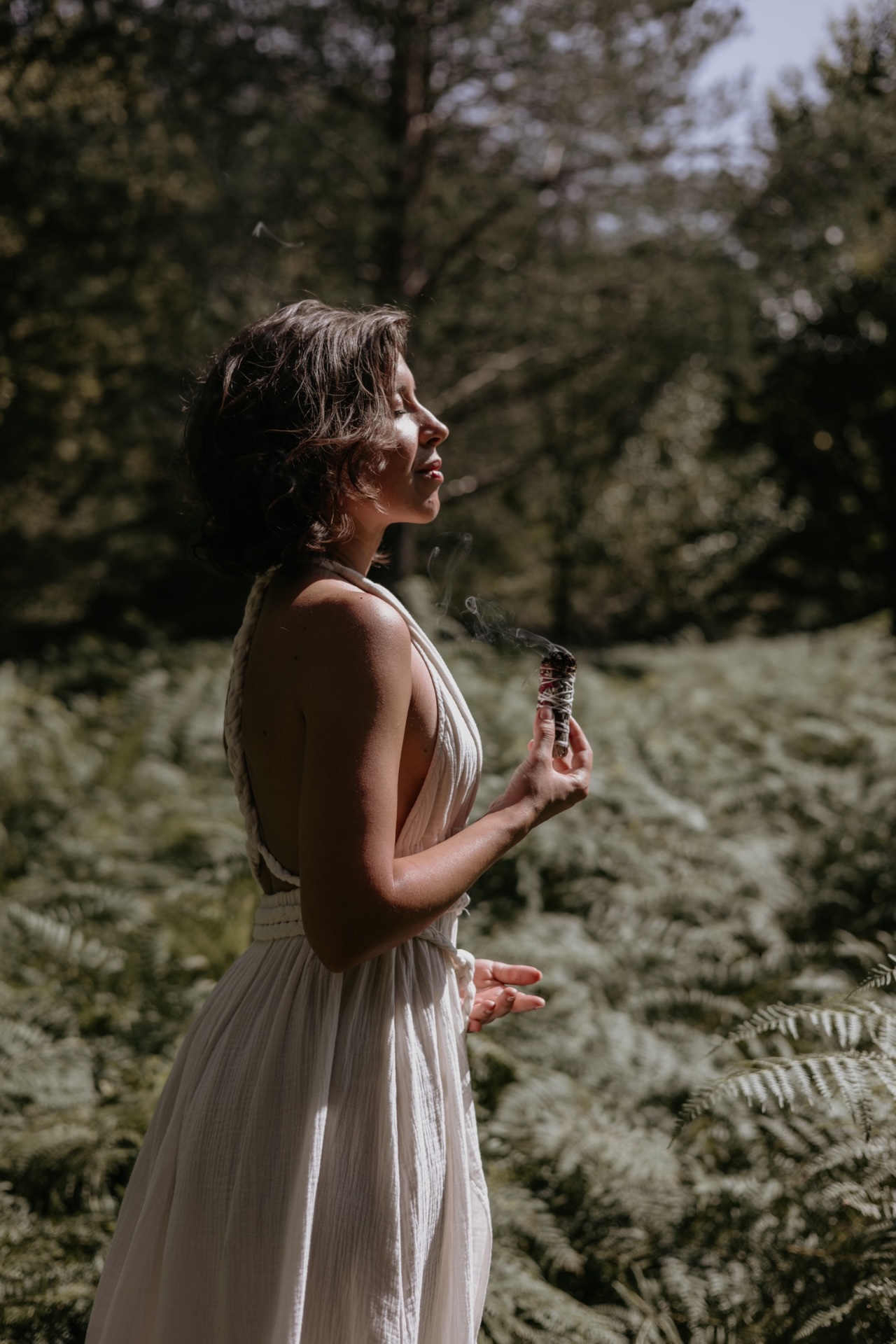 Private breathwork session in a candlelit room